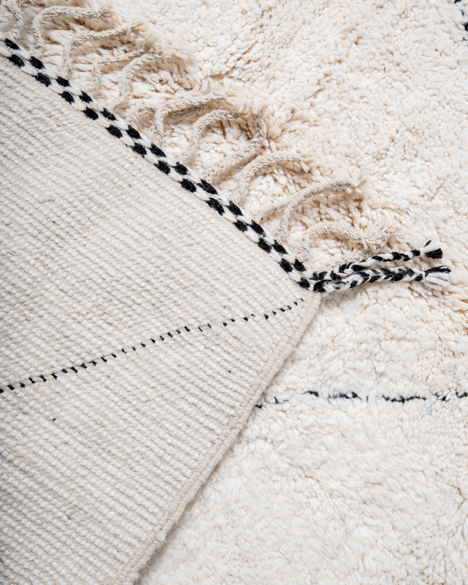 Modern, designer, handcrafted Berber rug from Morocco. Beniourain carpet with beautiful colours and patterns and fluffy wool texture.